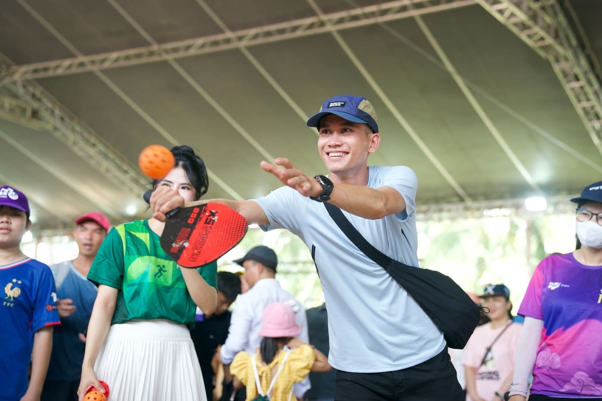 Бегун в очереди за игровой зоной Herbalife в VM Da Nang