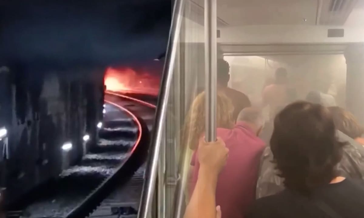 Hành khách vội sơ tán khi khói tràn vào toa tàu metro ở Barcelona